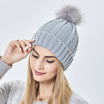 Stretchy Satin Lined Skull Knit Beanie w/ Faux Fur Pom Pom